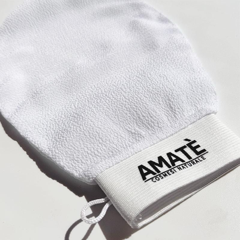 Guanto Kessa bianco con anello. Il guanto ha un polsino in tessuto bianco con il logo "AMATÈ".