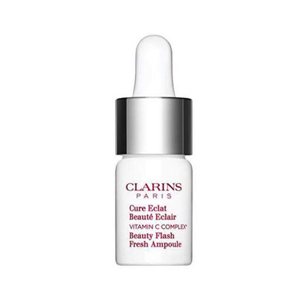 Piccola bottiglia bianca con 'Beauty Flash Fresh Ampoule'.