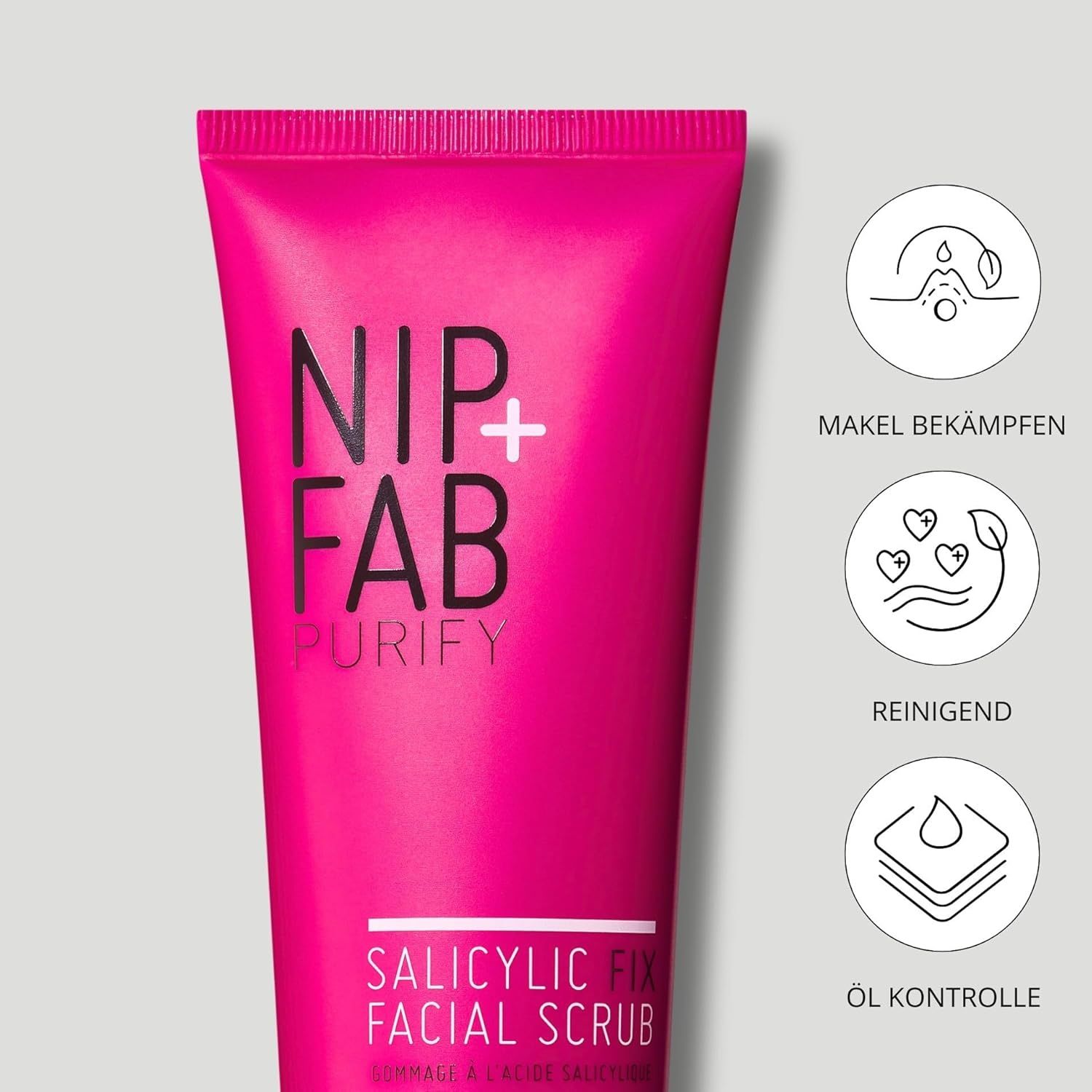 Tubo rosa con "NIP+FAB" e "Salicylic Fix Facial Scrub". Tre simboli: brufoli, pulizia, controllo dell'olio.