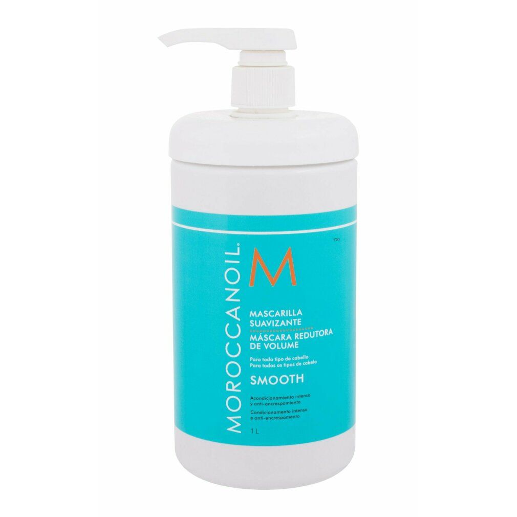 Contenitore bianco con etichetta blu. Scritta Moroccanoil, Mascarilla Suavizante, M. Con pompa.