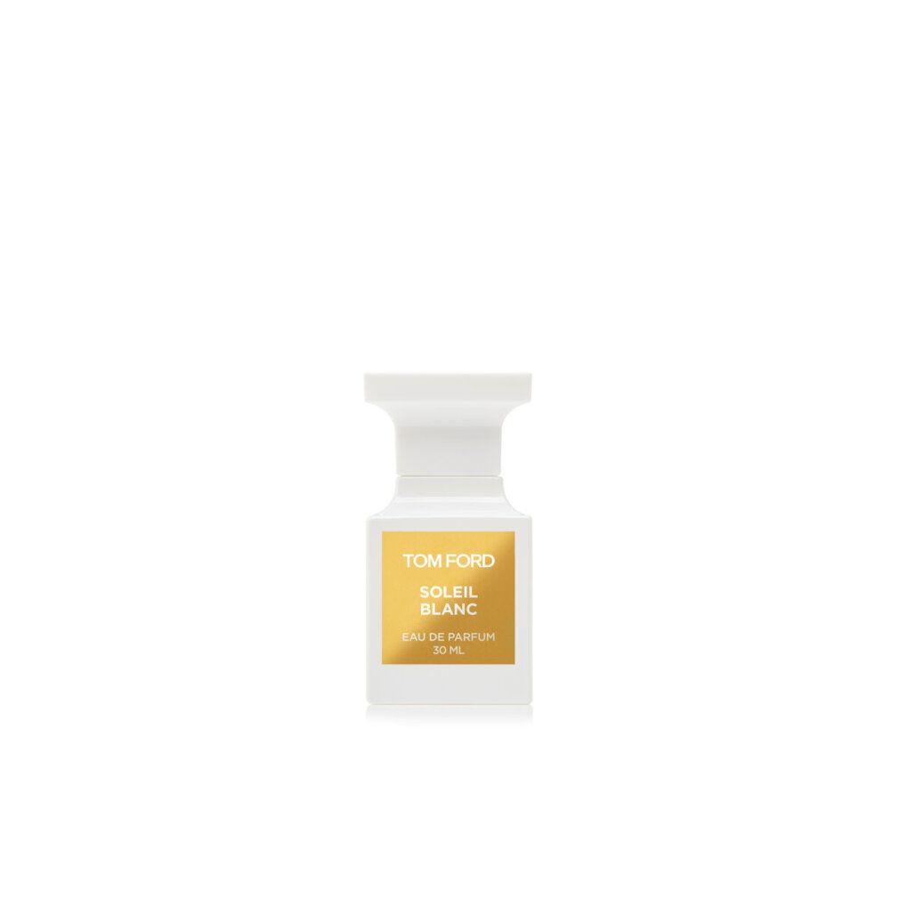 Flacone bianco con etichetta dorata. Scritta: TOM FORD, SOLEIL BLANC, Eau de Parfum.