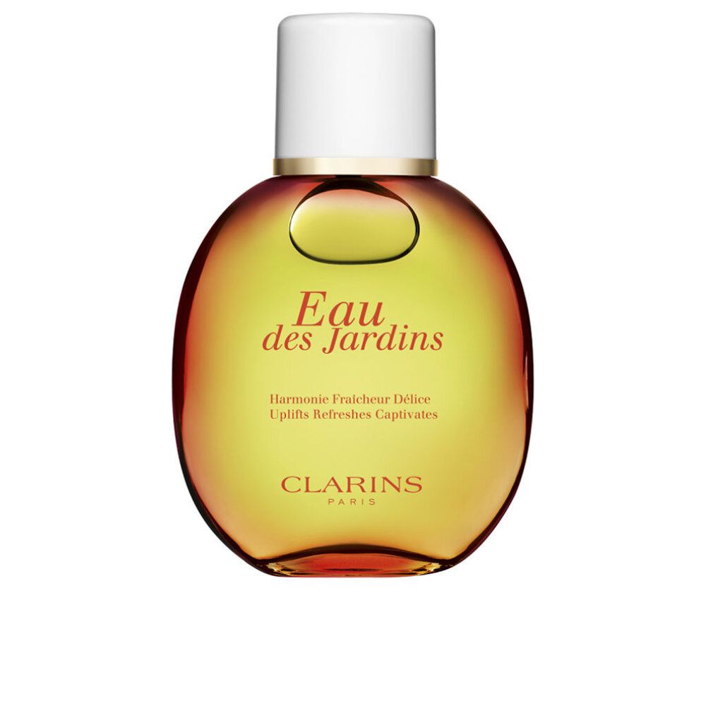 Flacone rotondo con tappo bianco. Scritta: Eau des Jardins. Sfumatura dal giallo al rosso. Clarins Paris.
