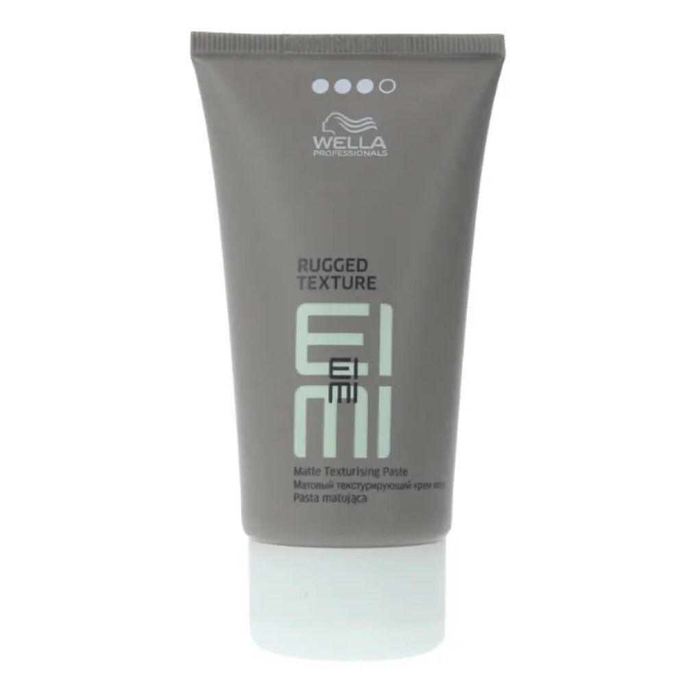 Tubo grigio con tappo bianco. Scritta: Wella EIMI Rugged Texture. Nome del prodotto e marchio visibili.