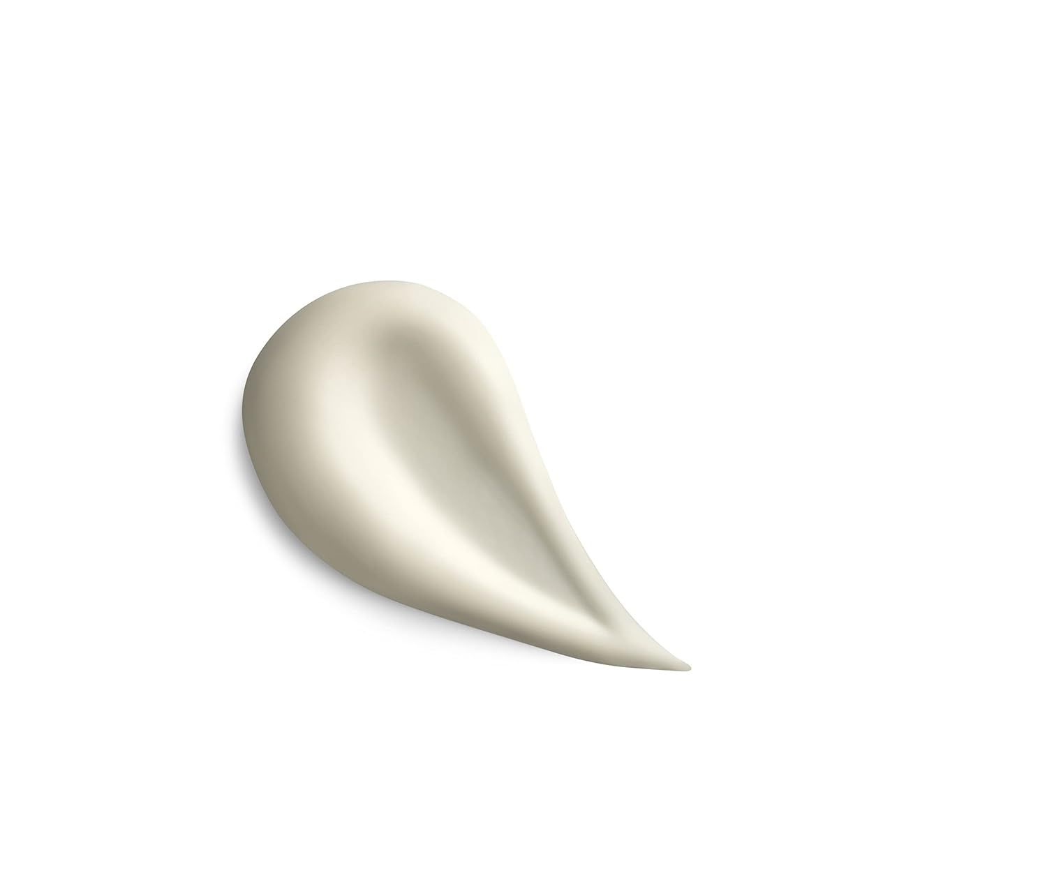 Macchia di crema beige chiaro, a forma di goccia, su sfondo bianco.