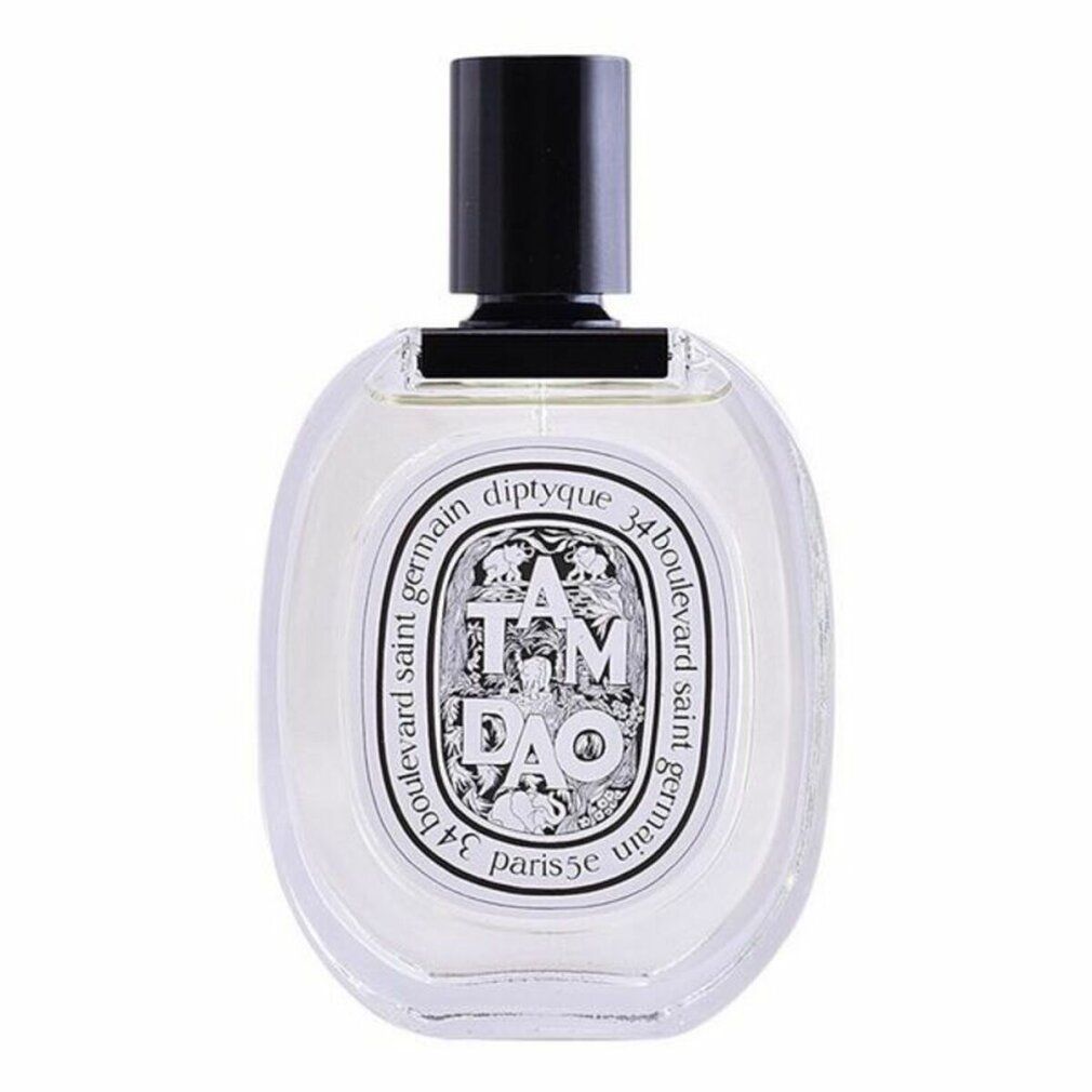 Flacone di profumo rotondo con tappo nero. Scritta Tam Dao, Diptyque, 34 boulevard saint germain, Paris 5e.