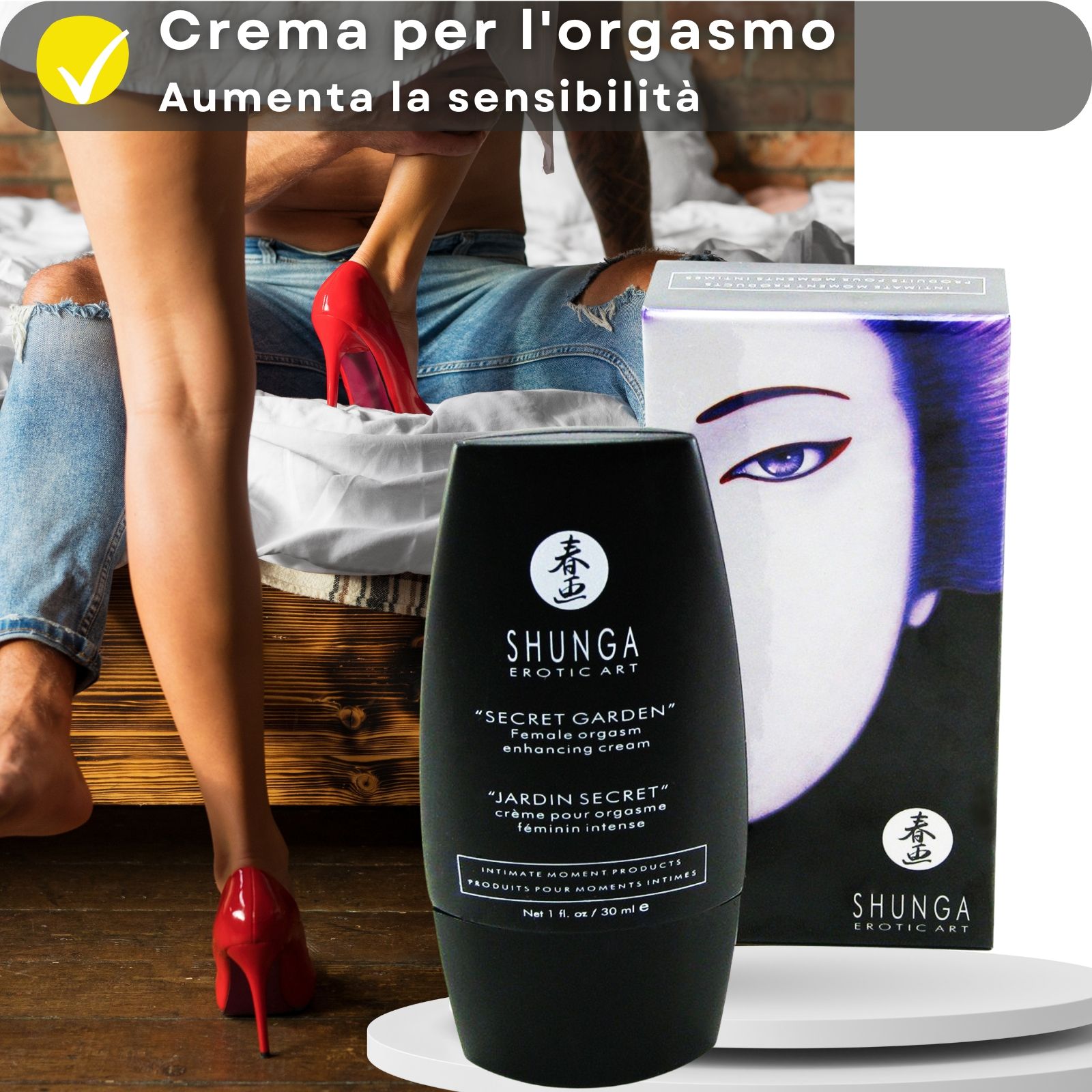 Flacone e scatola del prodotto. Testo in italiano. Nome prodotto: Shunga. Coppia sullo sfondo. Scarpe rosse.