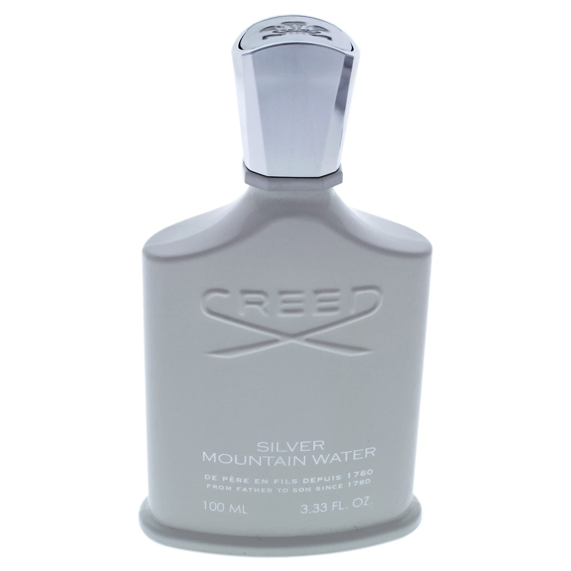 Flacone di profumo grigio. Scritta: Creed Silver Mountain Water. Flacone con tappo argentato.