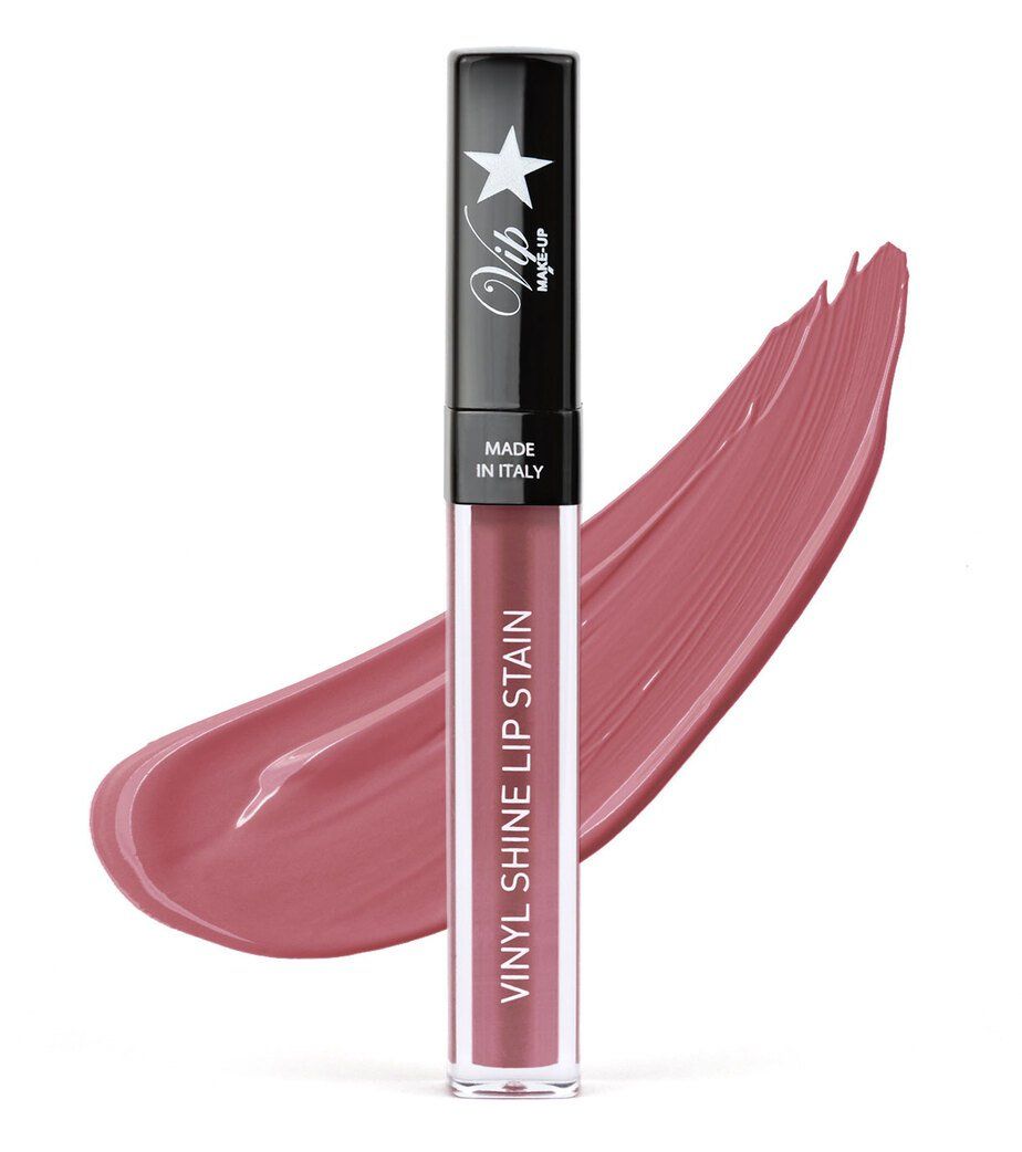 Un rossetto liquido color rosa con finitura lucida. Il contenitore è nero con scritte argentate e una stella. È stampato "Made in Italy".
