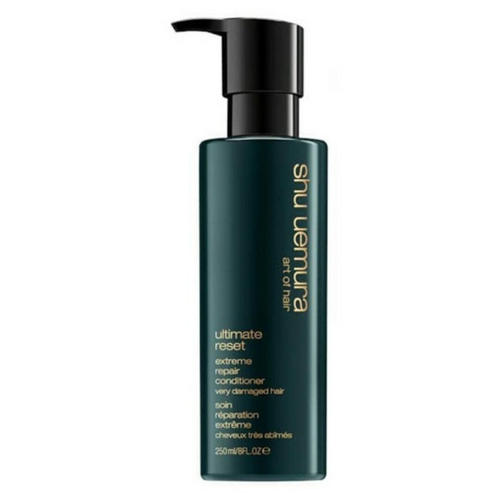 Flacone verde scuro con erogatore a pompa, Shu Uemura Ultimate Reset Extreme Repair Conditioner per capelli molto danneggiati, 250ml.