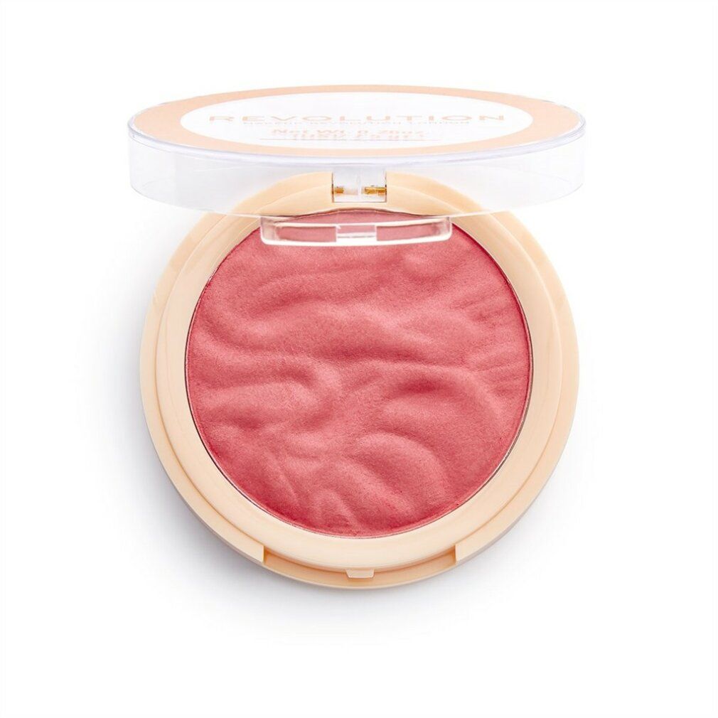 Una cialda rotonda color beige chiaro con coperchio trasparente, che rivela un fard rosa con una texture in rilievo ondulata.