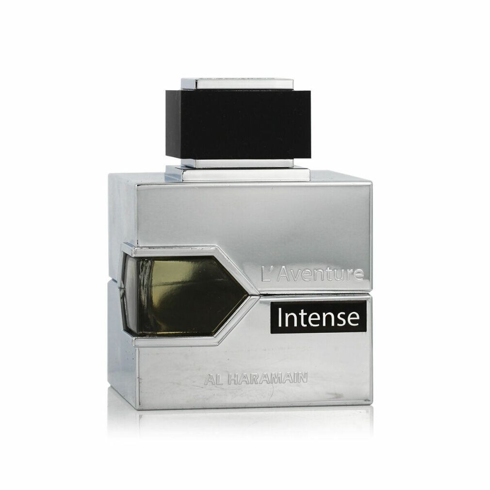 Flacone argentato con tappo nero. Scritta: L'Aventure Intense. Marchio Al Haramain.