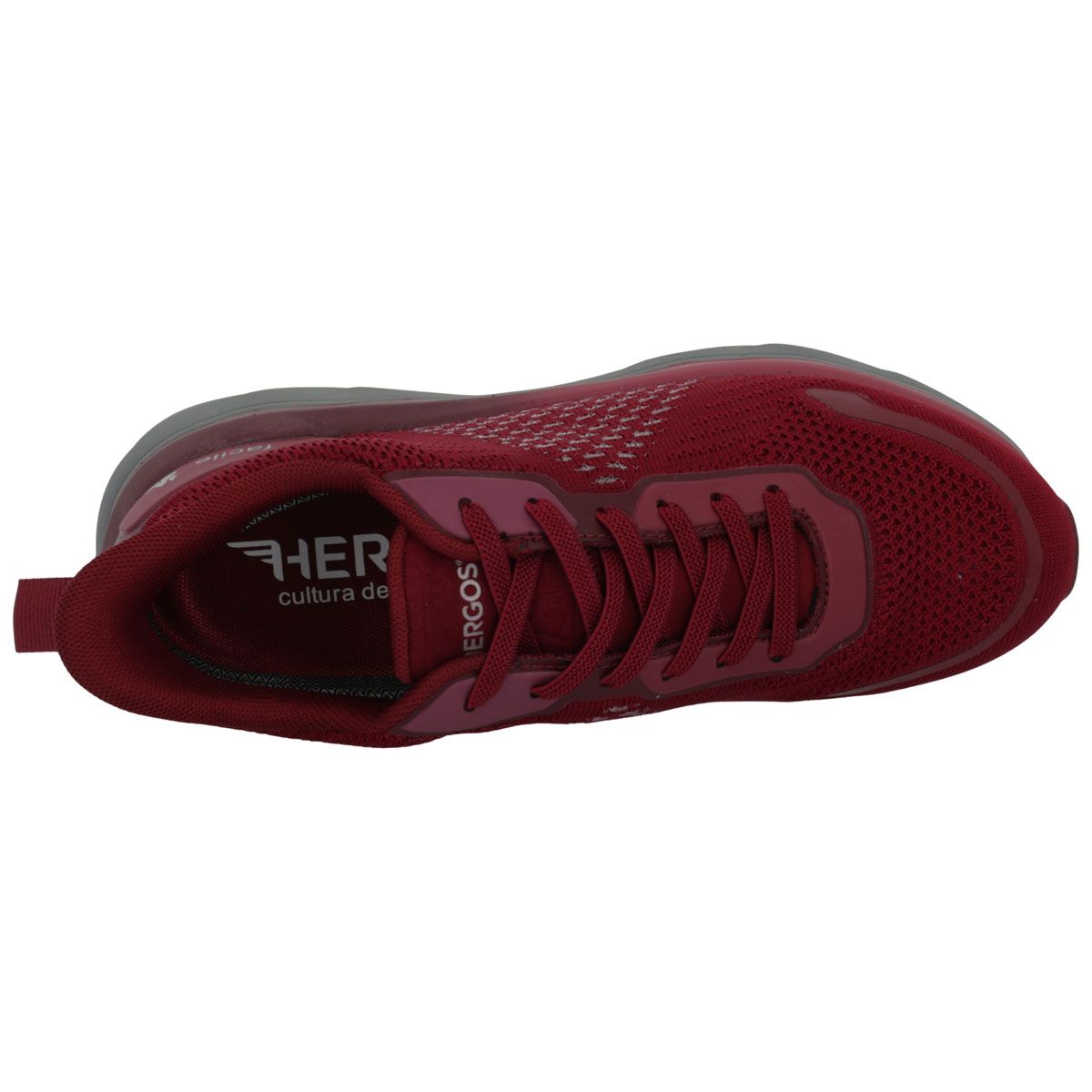 Scarpa sportiva rossa con suola grigia e lacci. Vista laterale.