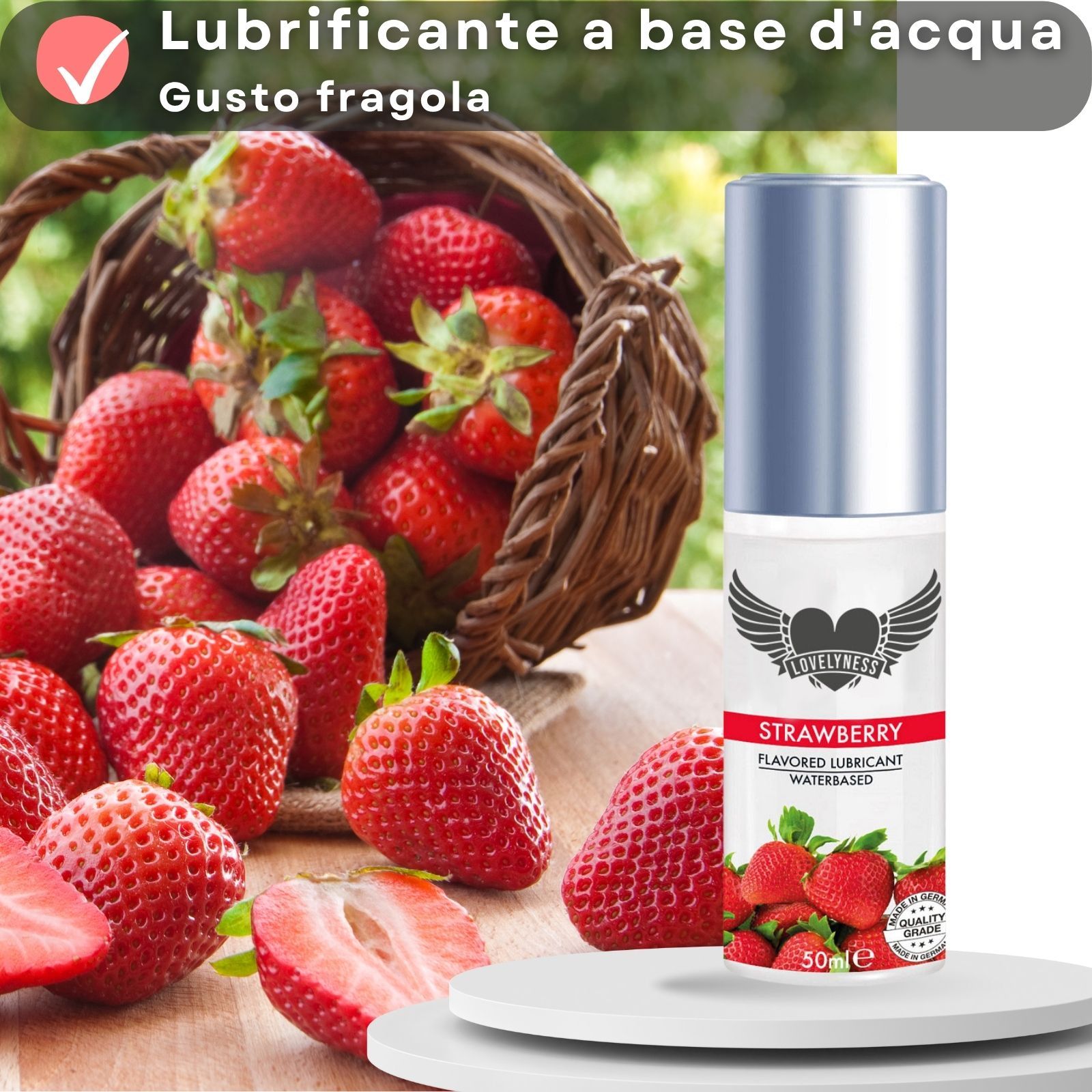 Flacone di lubrificante con fragole e testo. Testo: Strawberry, Flavored Lubricant, Waterbased.