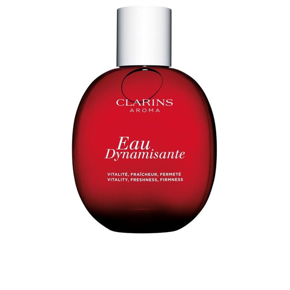 Flacone rotondo rosso con tappo bianco. Scritta: Clarins Aroma Eau Dynamisante. Testo: Vitalité, fraîcheur, fermeté.