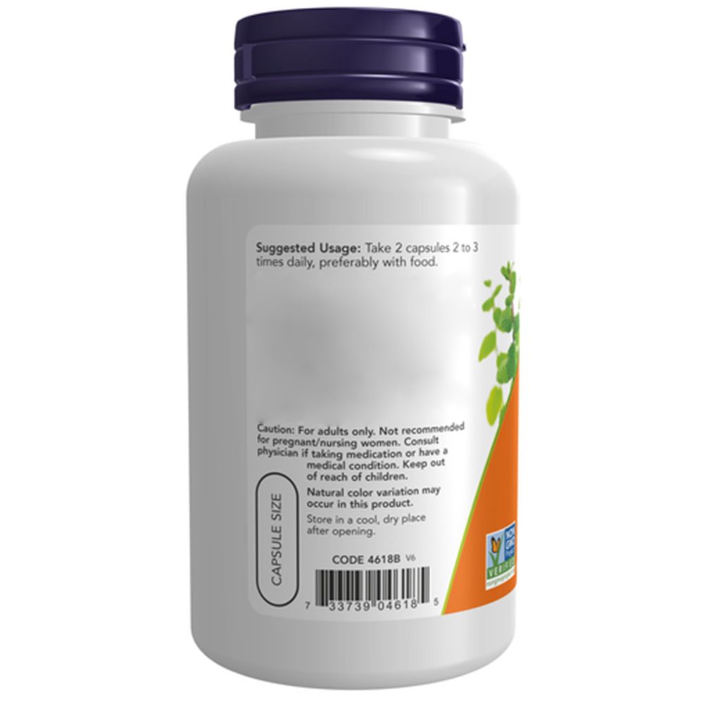 Contenitore bianco per capsule con tappo blu scuro ed etichetta con istruzioni e avvertenze.
