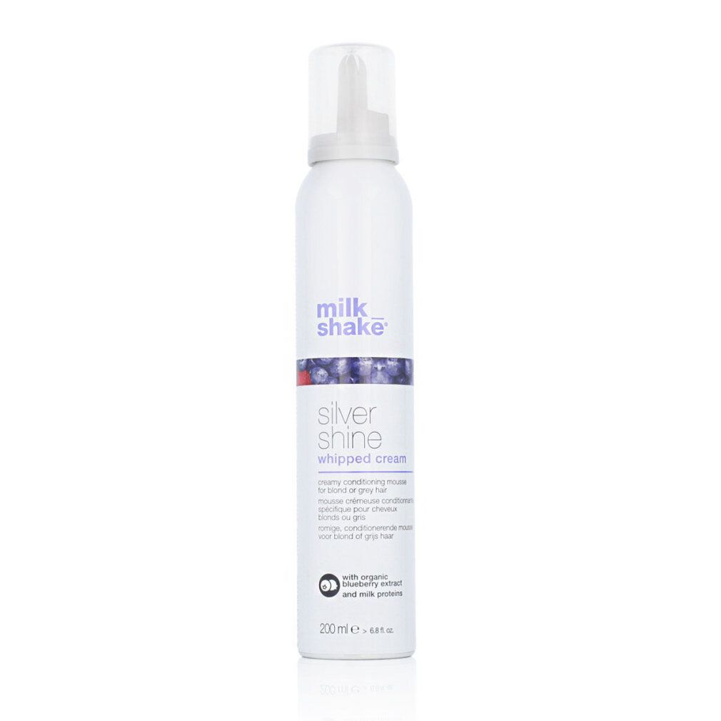 Flacone spray bianco con "milk shake silver shine whipped cream". Accenti blu e rossi. Contenuto 200 ml.