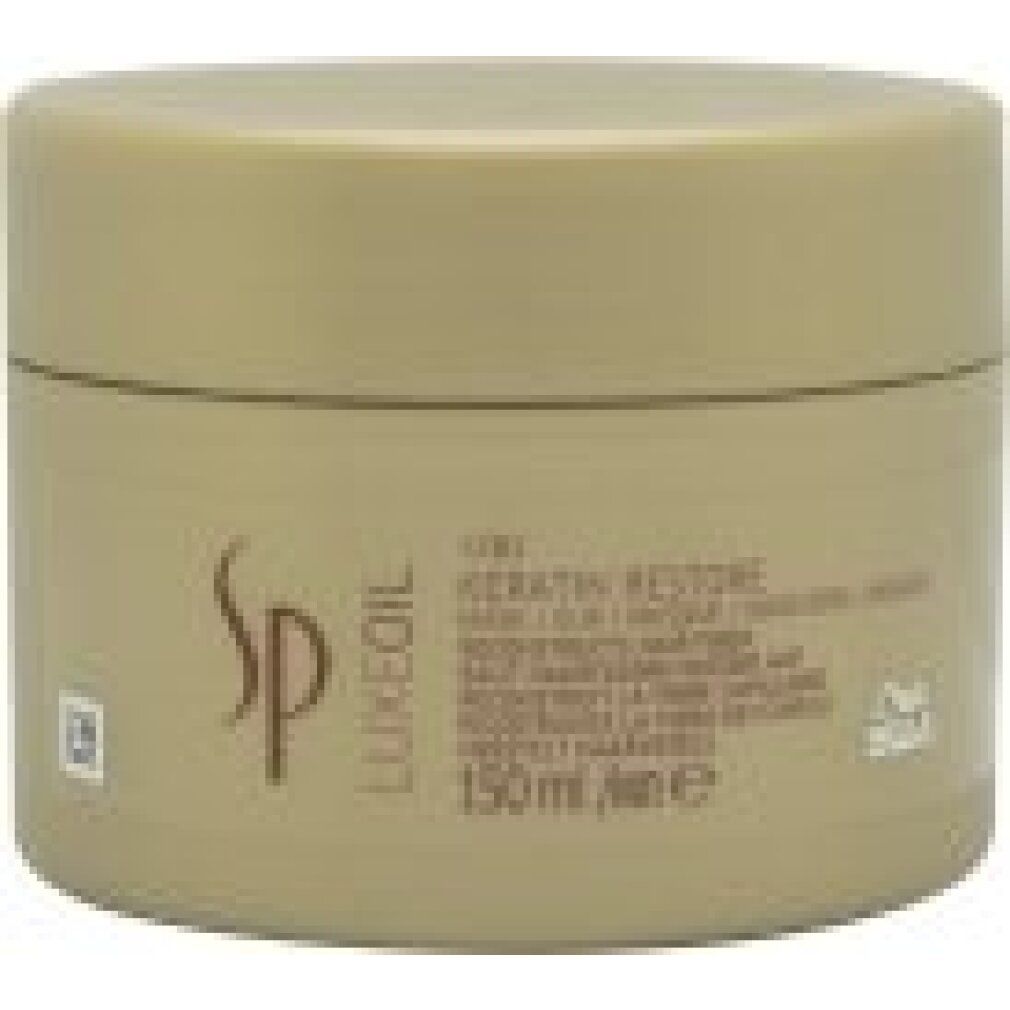 Barattolo beige con logo SP Luxeoil. Testo: Keratin Restore, 150ml. Logo Wella.