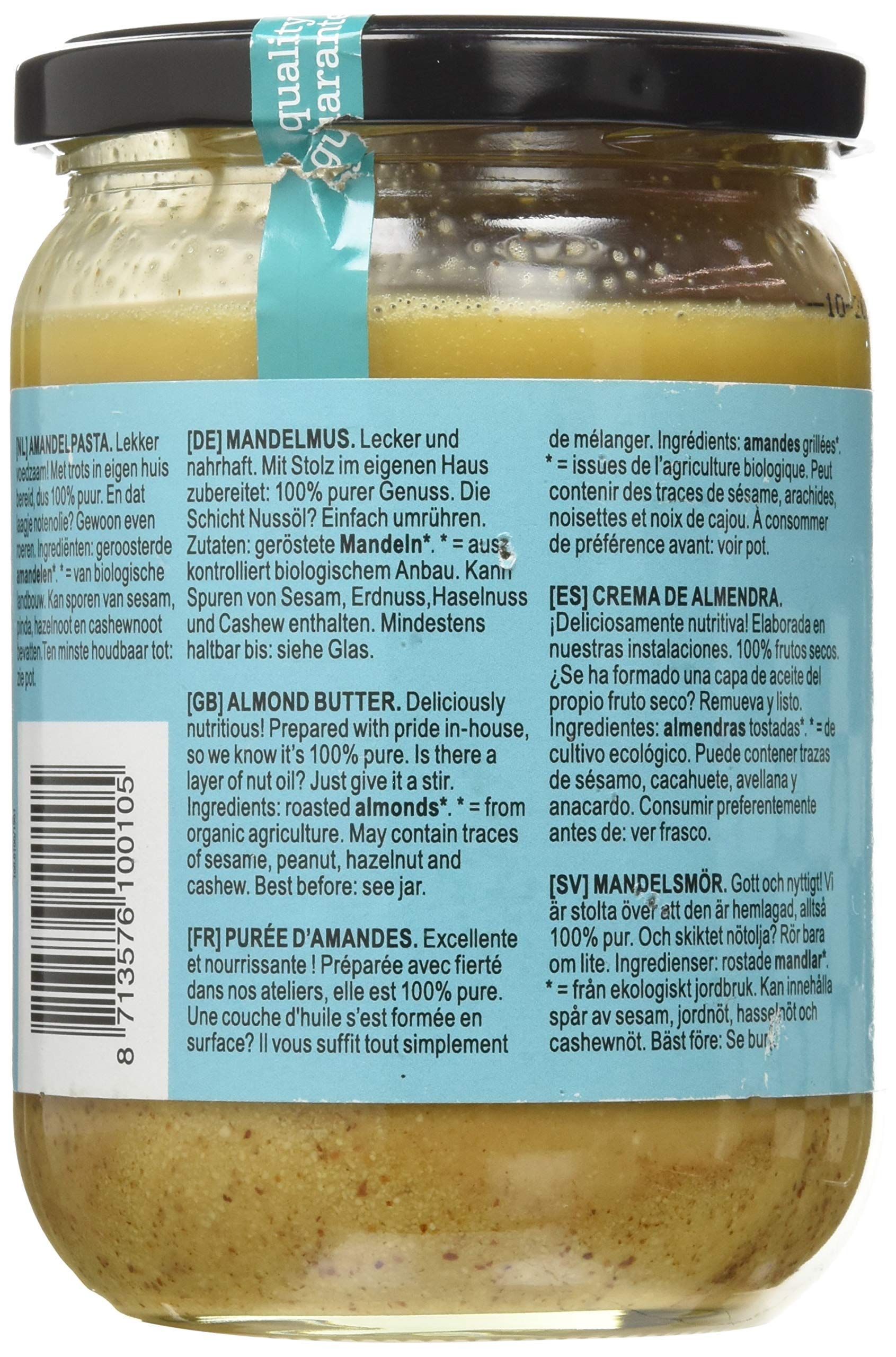 Vasetto di burro di mandorle. Etichetta multilingue con ingredienti, valori nutrizionali e sigillo biologico.