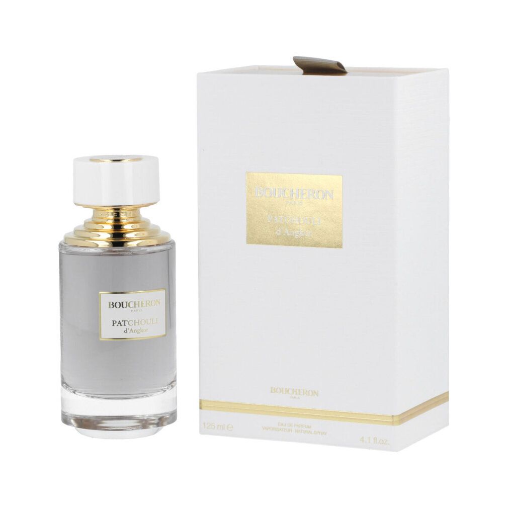 Flacone di profumo e confezione. Astuccio bianco con logo dorato. Flacone con tappo bianco e collo dorato.