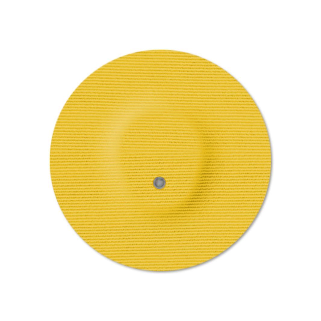 Cerotto rotondo giallo con foro centrale. Superficie tessuta.