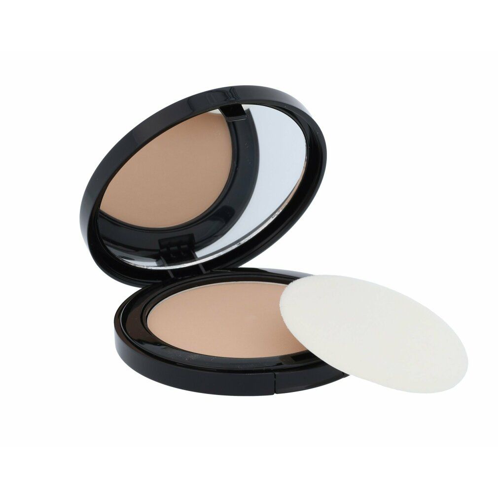 Artdeco High Definition Compact Powder con una spugnetta bianca accanto al contenitore aperto.