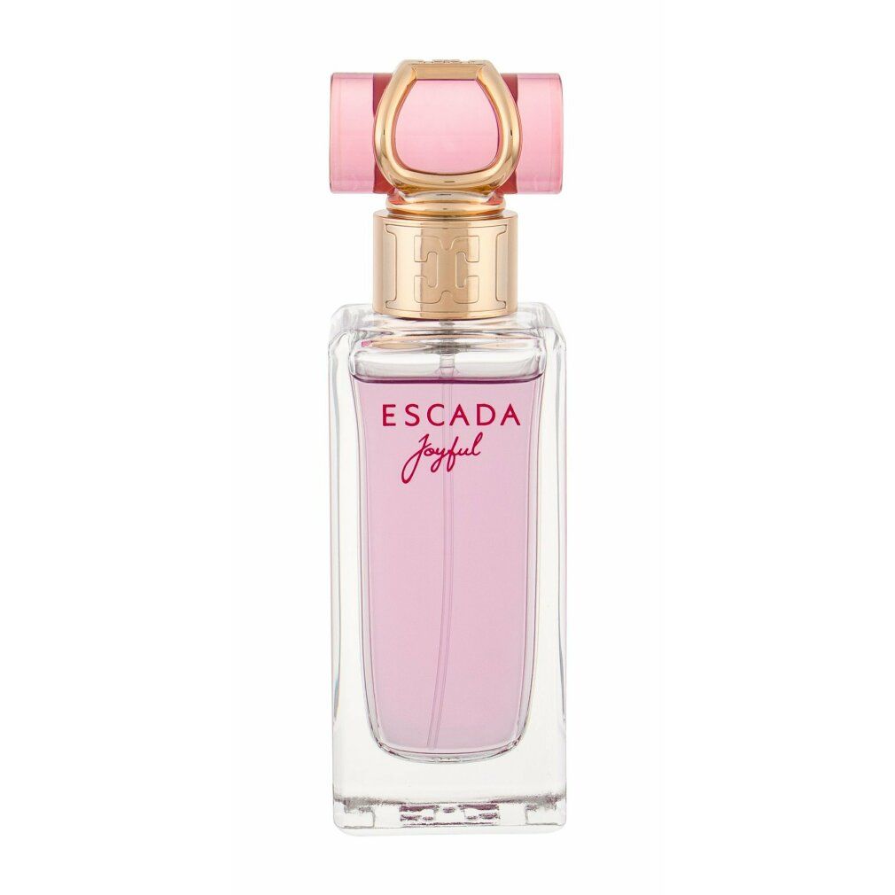 Flacone di profumo. Forma rettangolare, liquido rosa, tappo dorato con elementi rosa. Scritta Escada Joyful.