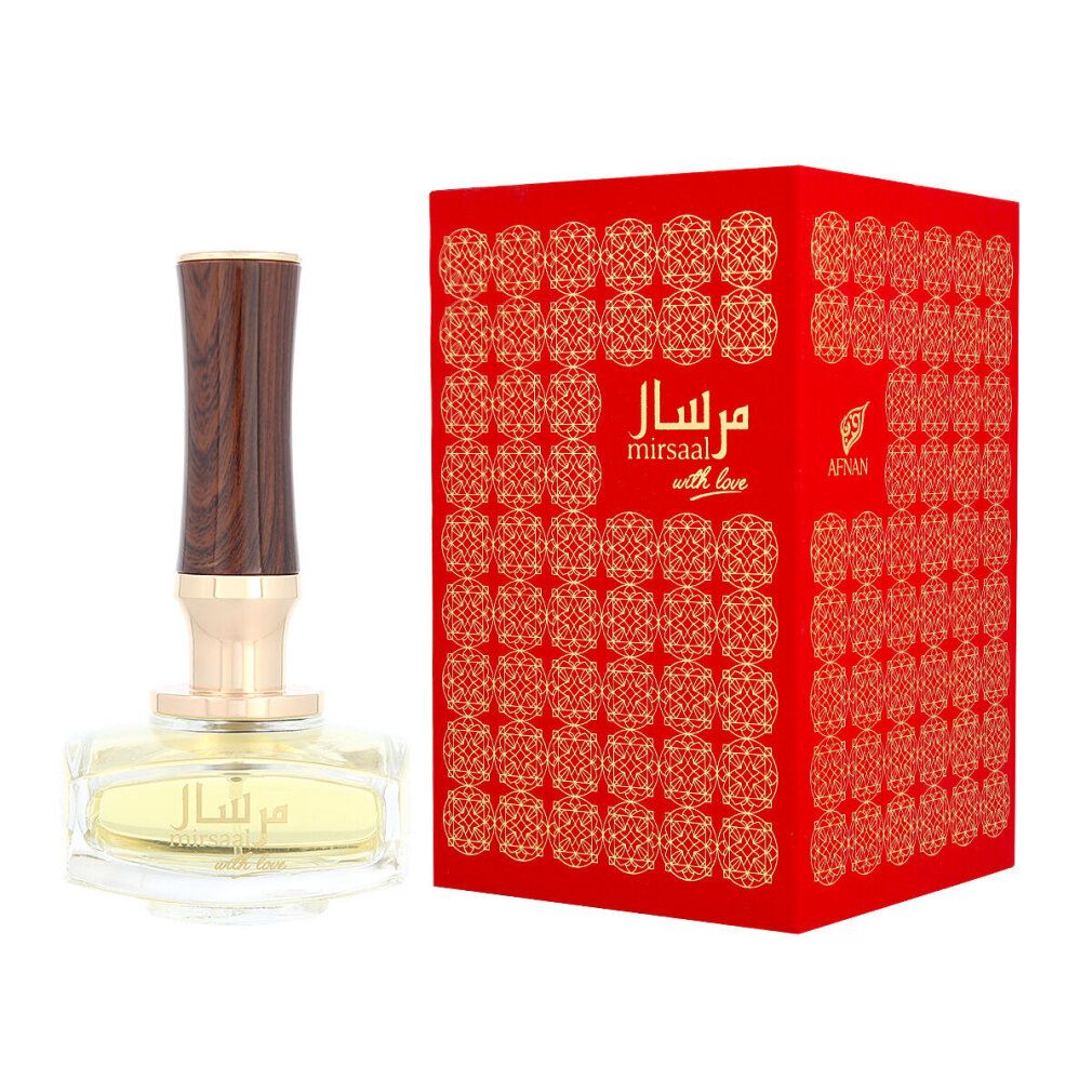 Flacone di profumo con tappo in legno e collo dorato, accanto a scatola rossa. Scrittura araba e 'with love' su flacone e scatola.