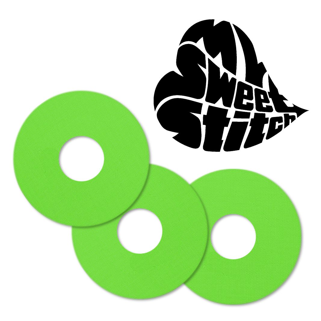 Tre anelli di fissaggio verdi con foro centrale. Logo 'MySweetStitch' a forma di cuore.