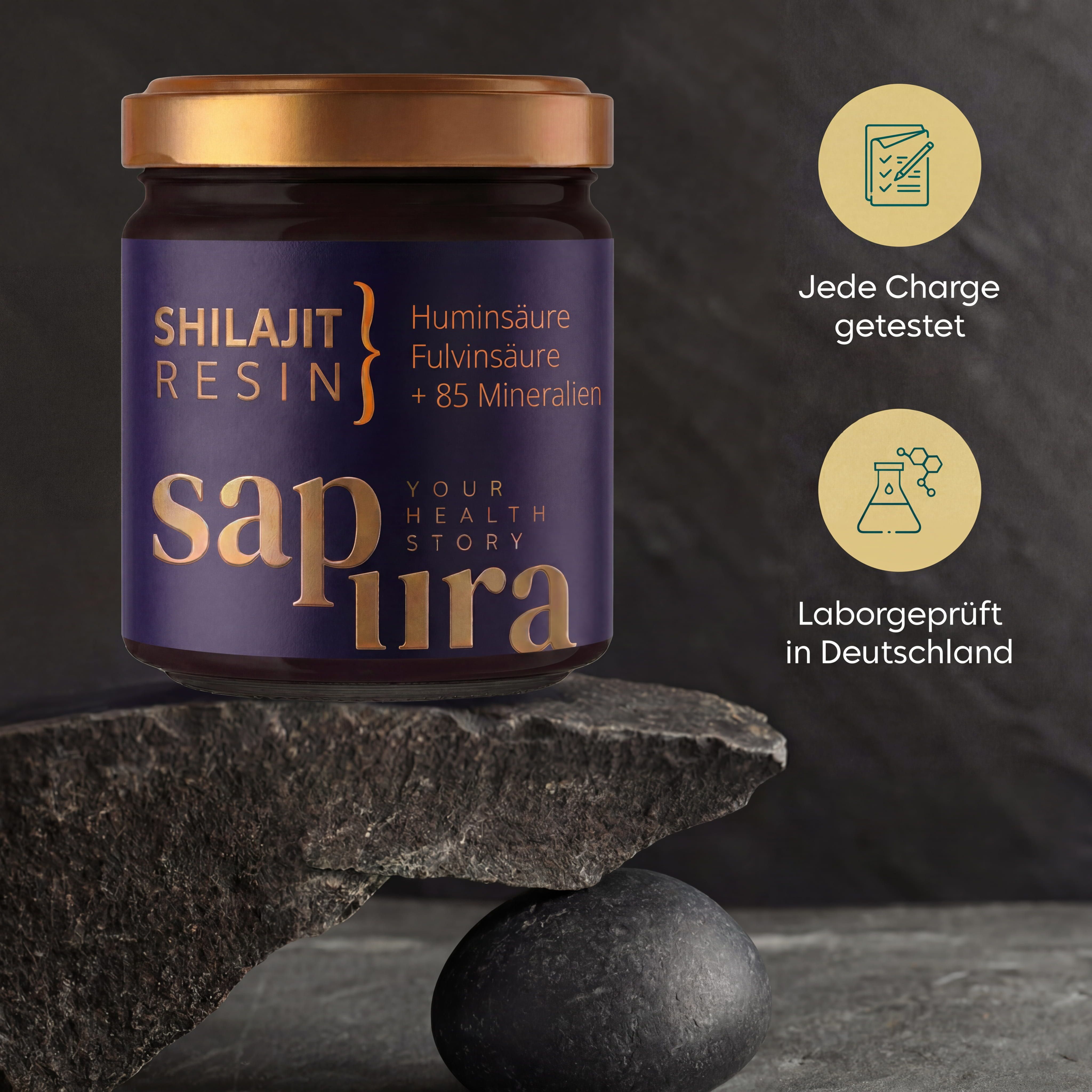 Resina di Shilajit in barattolo su pietra. Sinistra: simbolo di test. Destra: testato in laboratorio in Germania.