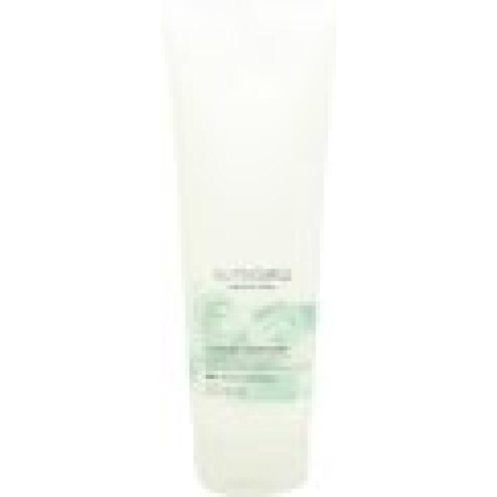 Tubo bianco con etichetta verde. Scritta: Nutricurls, Cleansing Conditioner. Marchio: Wella.
