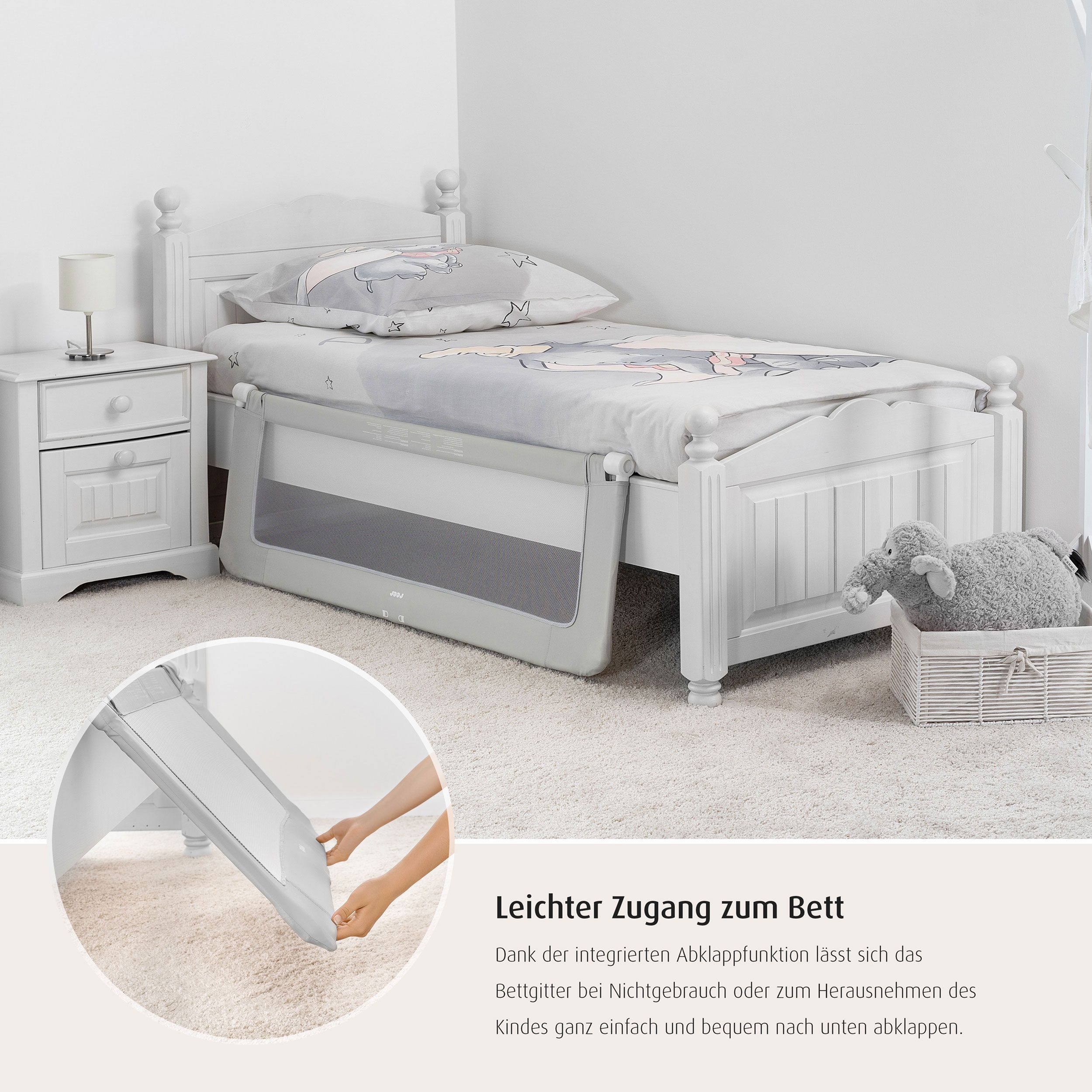 Barriera letto montata sul letto. Grigia con rete bianca. Marchio reer. Testo: Facile accesso al letto.