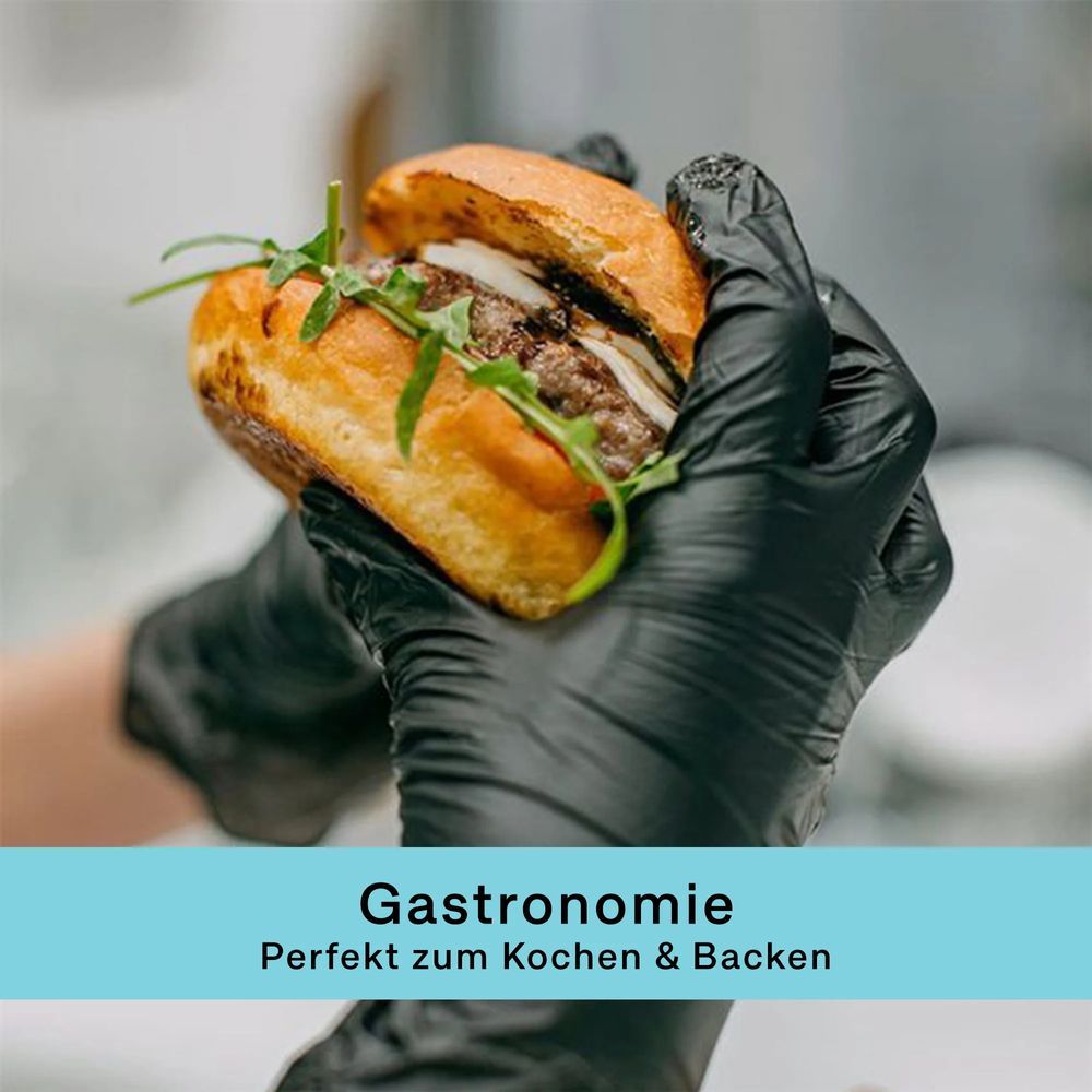 Mani con guanti neri tengono un hamburger. Testo: Gastronomia, perfetto per cucinare e cuocere al forno.
