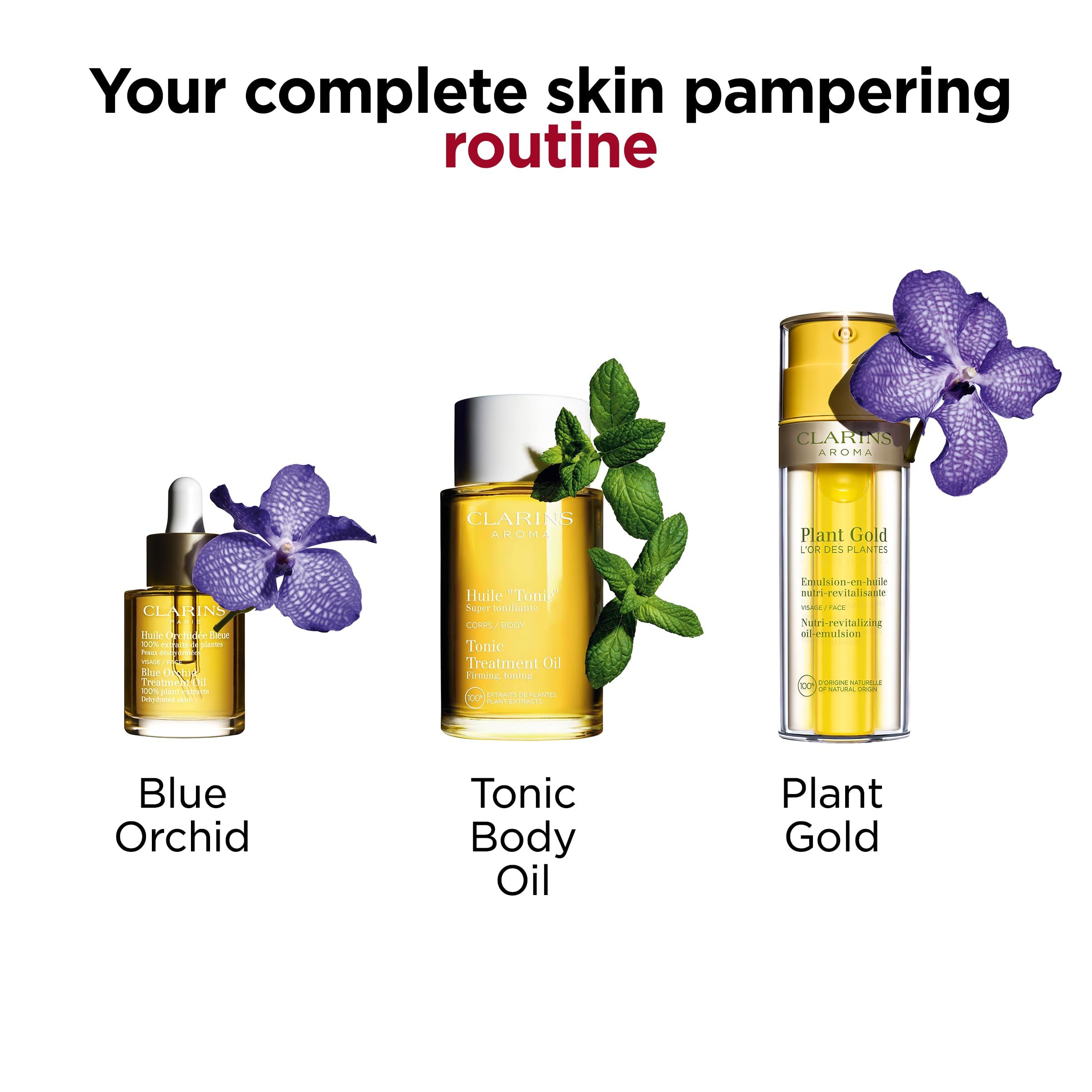Tre prodotti Clarins: Blue Orchid, Tonic Body Oil, Plant Gold. Con orchidee e menta. Testo: Your complete skin pampering routine.