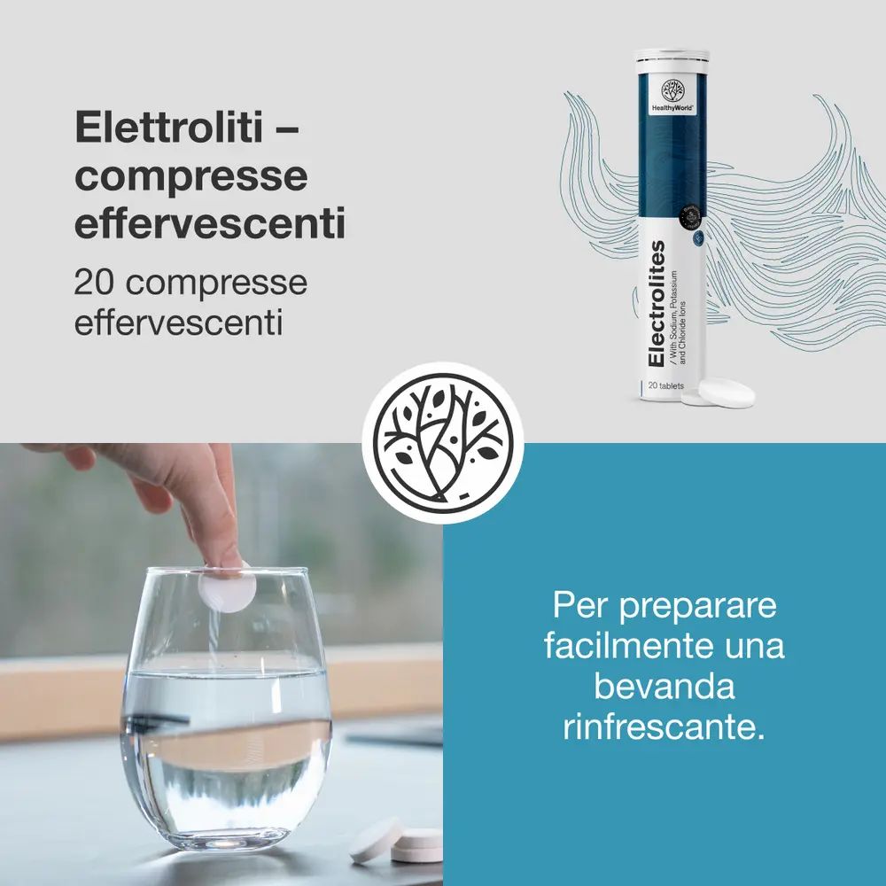 Una compressa effervescente si scioglie in un bicchiere d'acqua, accanto un tubo di compresse di elettroliti.