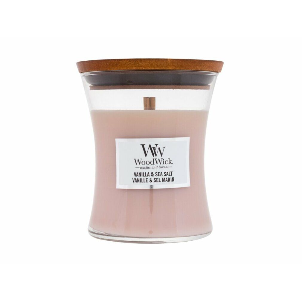 Candela a clessidra con coperchio. Etichetta "WoodWick Vanilla & Sea Salt".