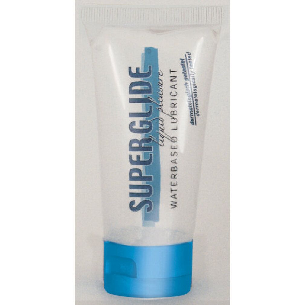 Piccolo tubo trasparente con tappo blu. Scritta: SUPERGLIDE, waterbased lubricant.