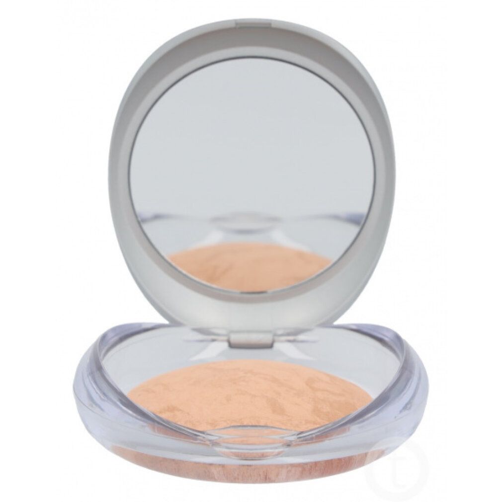 Contenitore cosmetico rotondo aperto con specchio. Contiene polvere chiara. Coperchio trasparente.