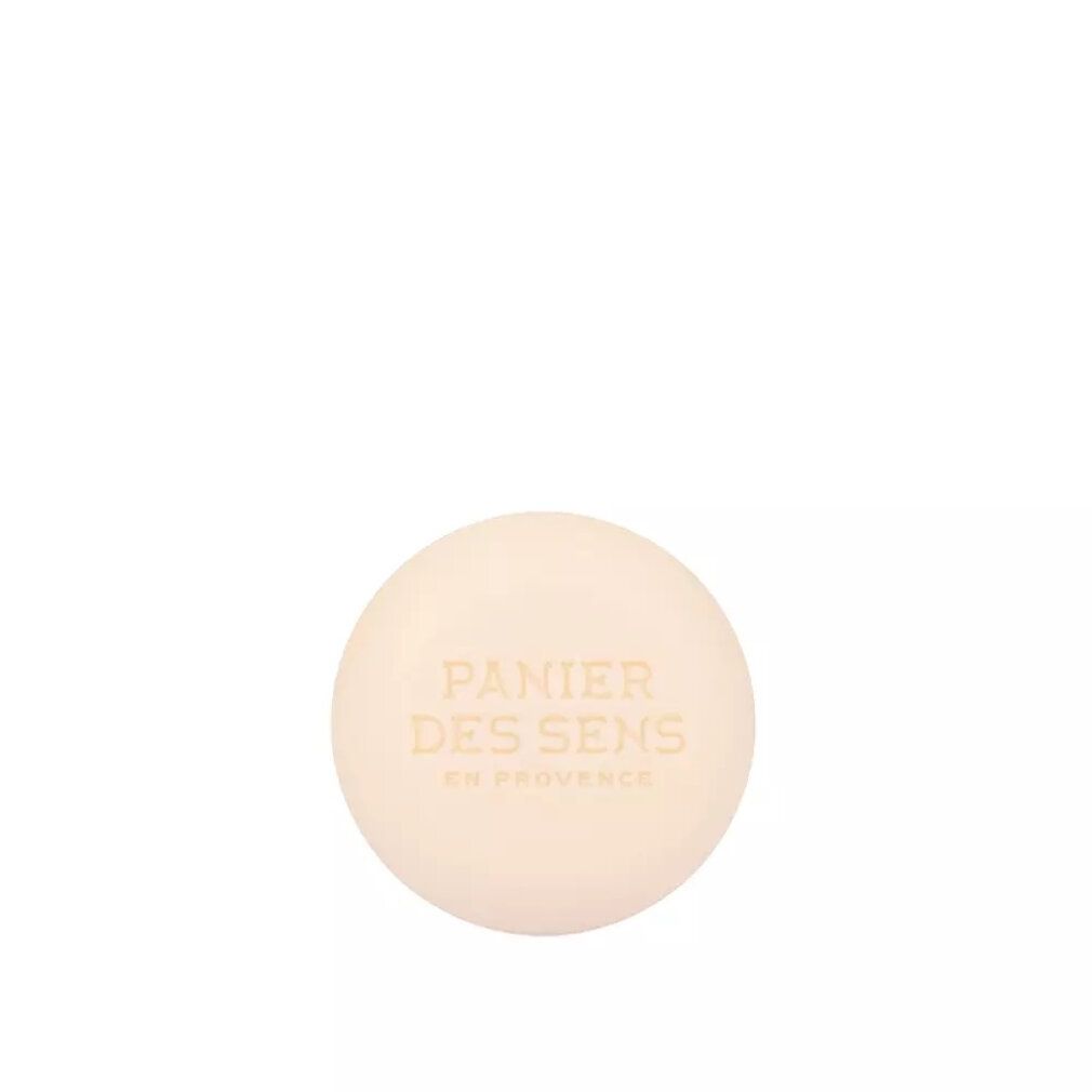Shampoo solido rotondo beige chiaro. Marchio "Panier des Sens en Provence" impresso.
