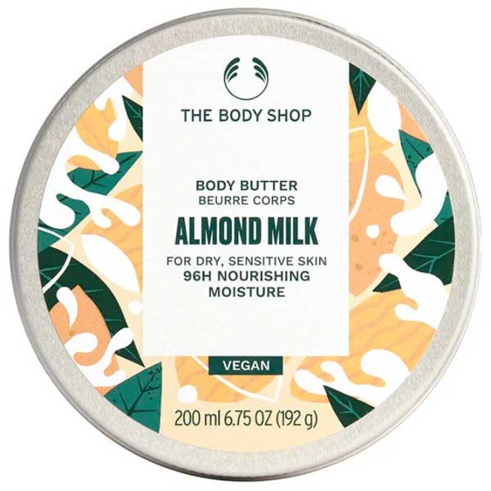 Vasetto rotondo con coperchio argentato. Logo: The Body Shop. Scritta: Body Butter Almond Milk. Vegan. 200 ml.