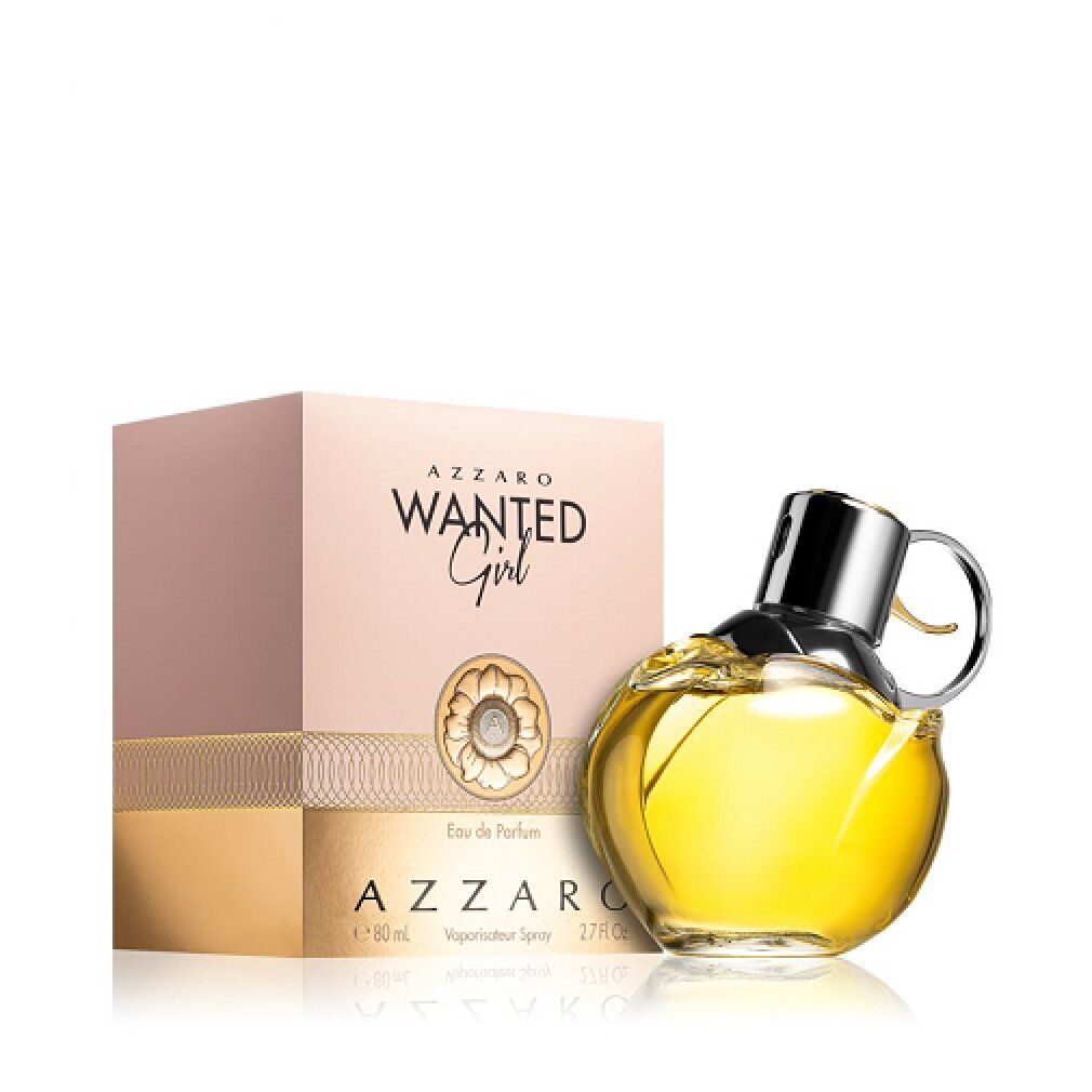 Flacone di profumo e confezione. Flacone con tappo argentato, liquido giallo. Confezione con testo.
