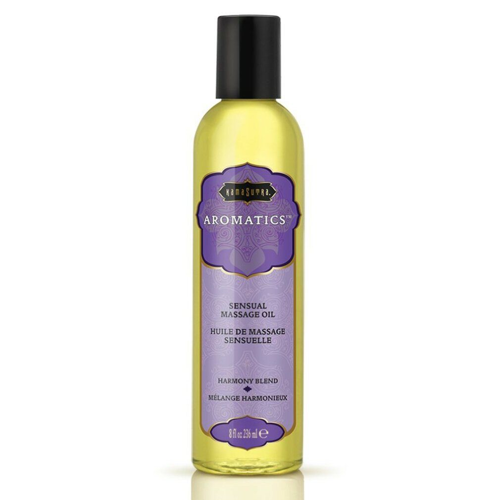 Flacone giallo con tappo nero. Etichetta viola con testo: "Kamasutra Aromatics Sensual Massage Oil Harmony Blend".