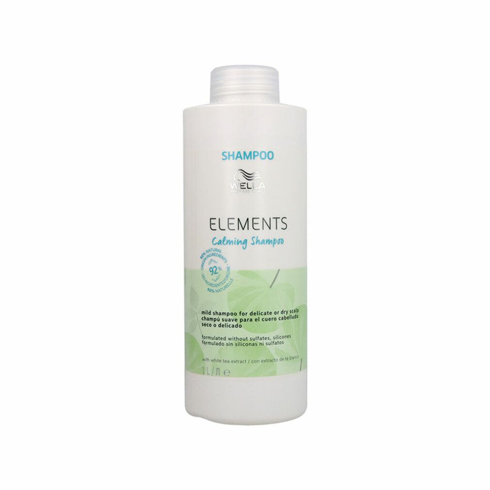 Flacone di shampoo bianco con etichetta verde. Scritta: Wella Elements, Calming Shampoo. 92% ingredienti naturali.