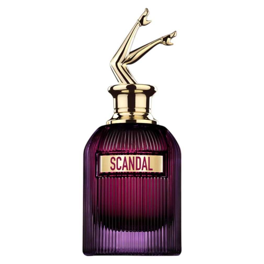 Flacone rosso scuro con gambe dorate come tappo. Scritta "SCANDAL" su etichetta rettangolare.