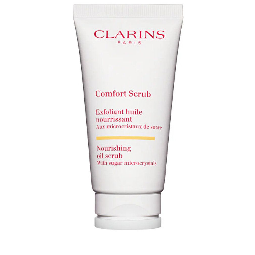 Tubo bianco con testo rosso. Sopra: Clarins Paris. Centro: Comfort Scrub. Sotto: Nourishing oil scrub.