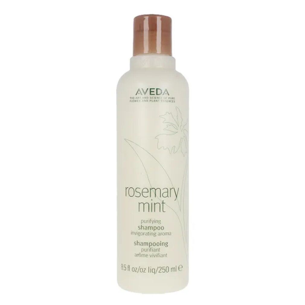 Flacone di shampoo Aveda. Etichetta bianca con testo e logo. Tappo marrone. Nome prodotto: Rosemary Mint.