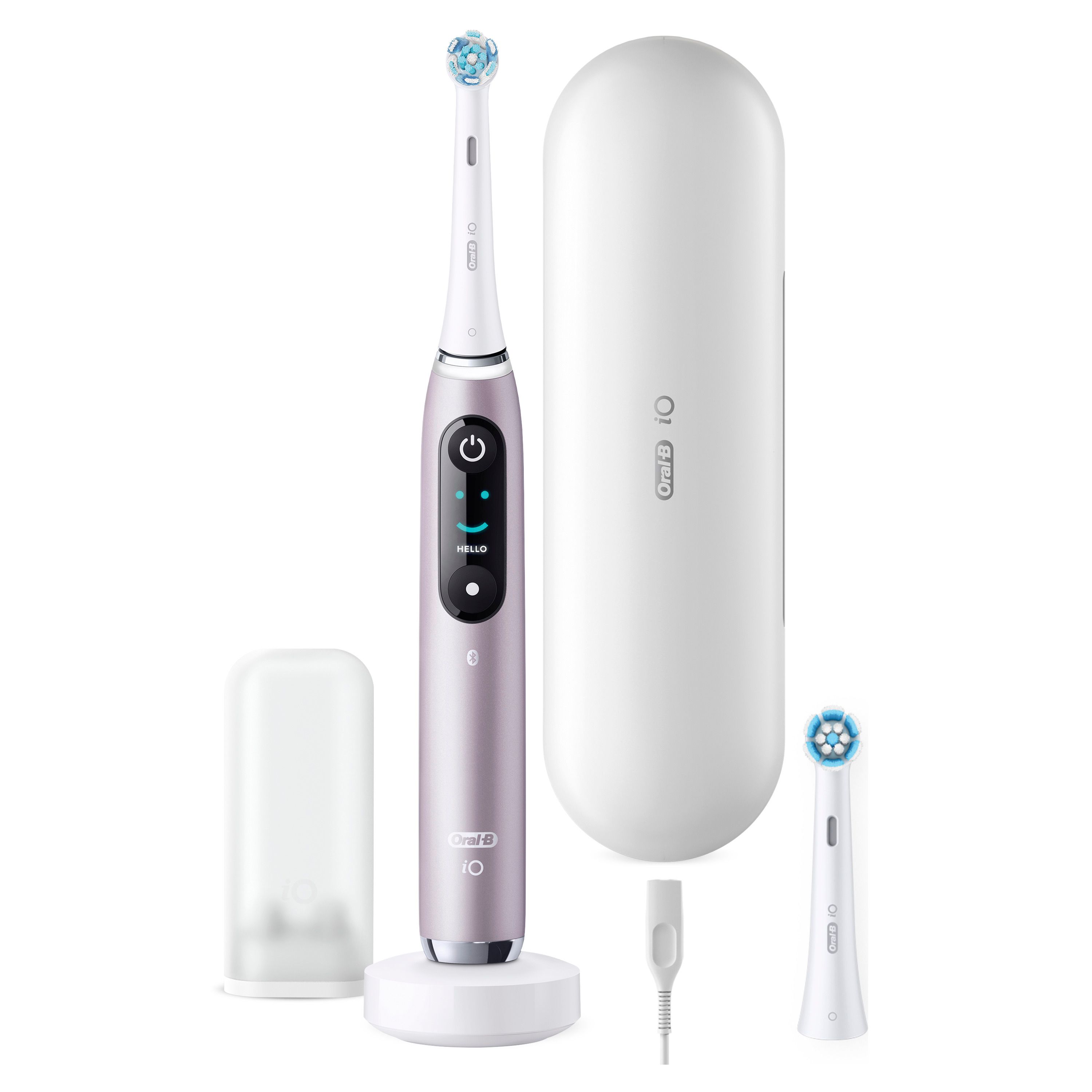 Spazzolino elettrico rosa, stazione di ricarica, custodia da viaggio e due testine. Oral-B iO Series 9.
