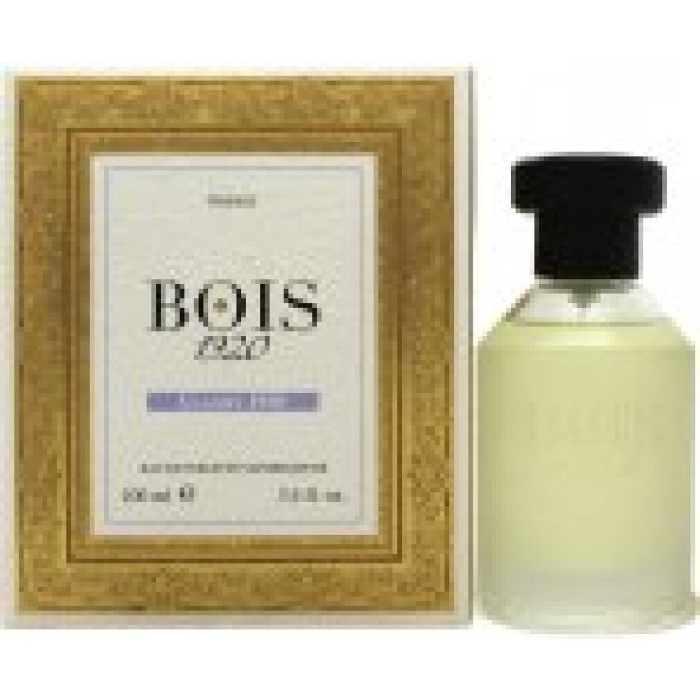 Flacone di profumo e confezione. Flacone con tappo nero, liquido chiaro. Confezione con cornice dorata e testo.