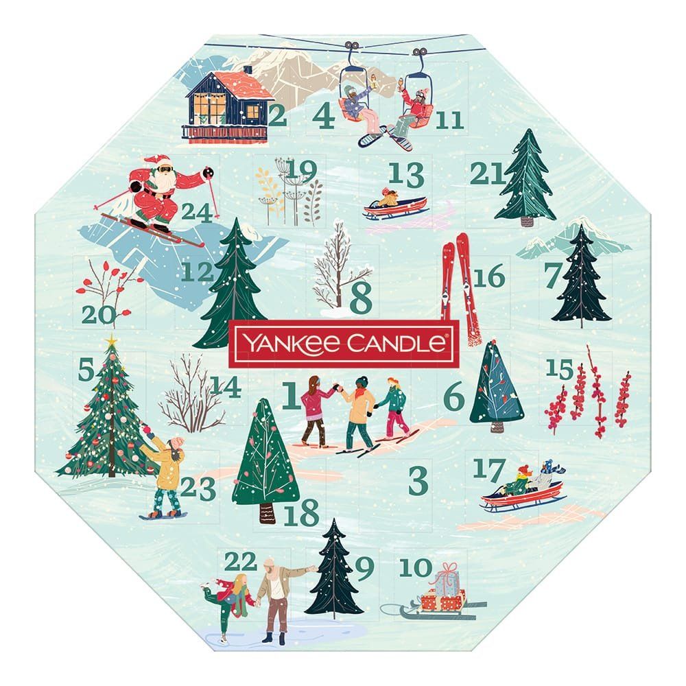 Calendario dell'Avvento Yankee Candle ottagonale. Scena invernale con figure e alberi. 24 finestre numerate.