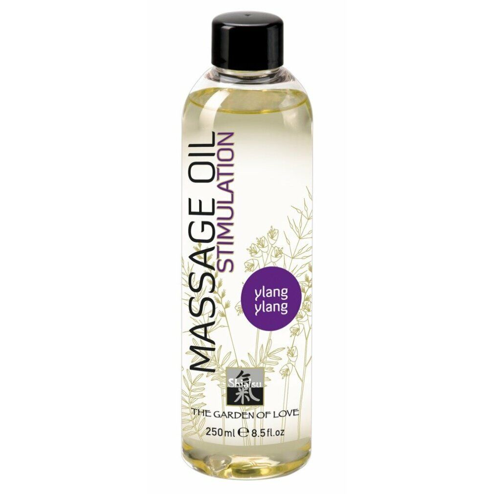 Flacone di olio per massaggio con tappo nero. Scritta: Massage Oil Stimulation, Ylang Ylang, The Garden of Love.