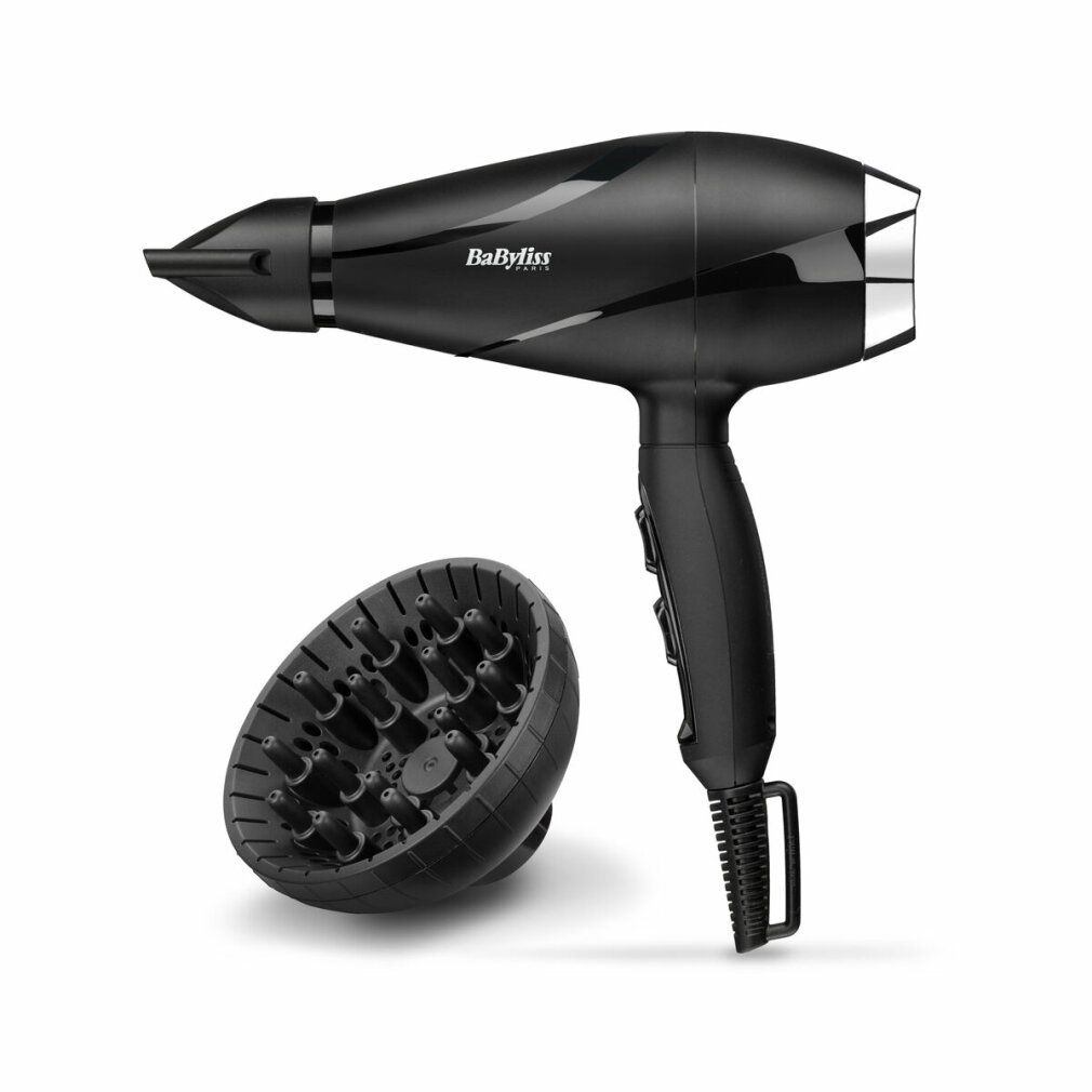 Asciugacapelli nero con diffusore. Marca: BaByliss. Diffusore accanto. Impugnatura con comandi.